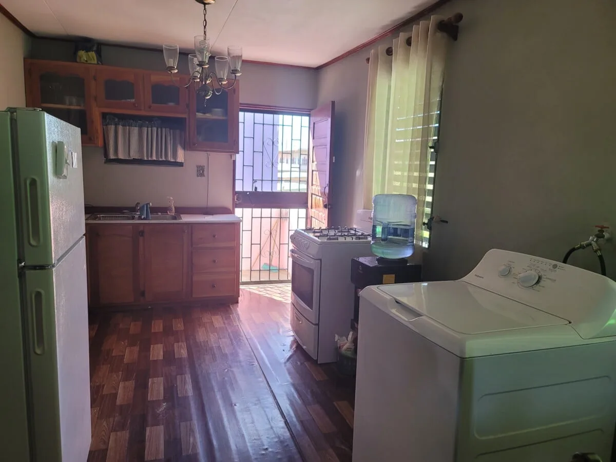 20231209_103817 FOR SALE – 2 STOREY DWELLING ON MAHOGANY STREET, ST MARTINS DE PORRES, BELIZE CITY