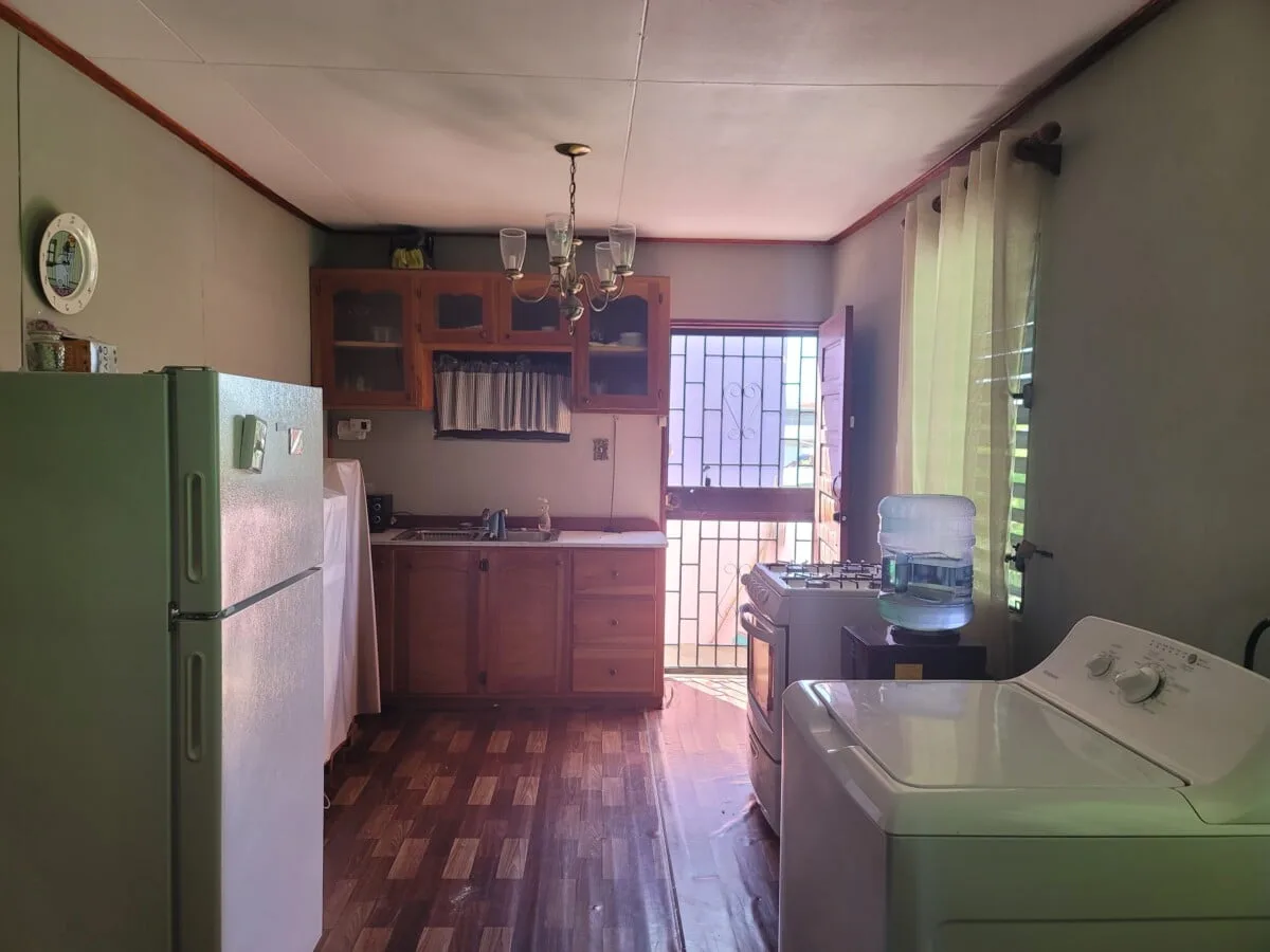 20231209_103827 FOR SALE – 2 STOREY DWELLING ON MAHOGANY STREET, ST MARTINS DE PORRES, BELIZE CITY