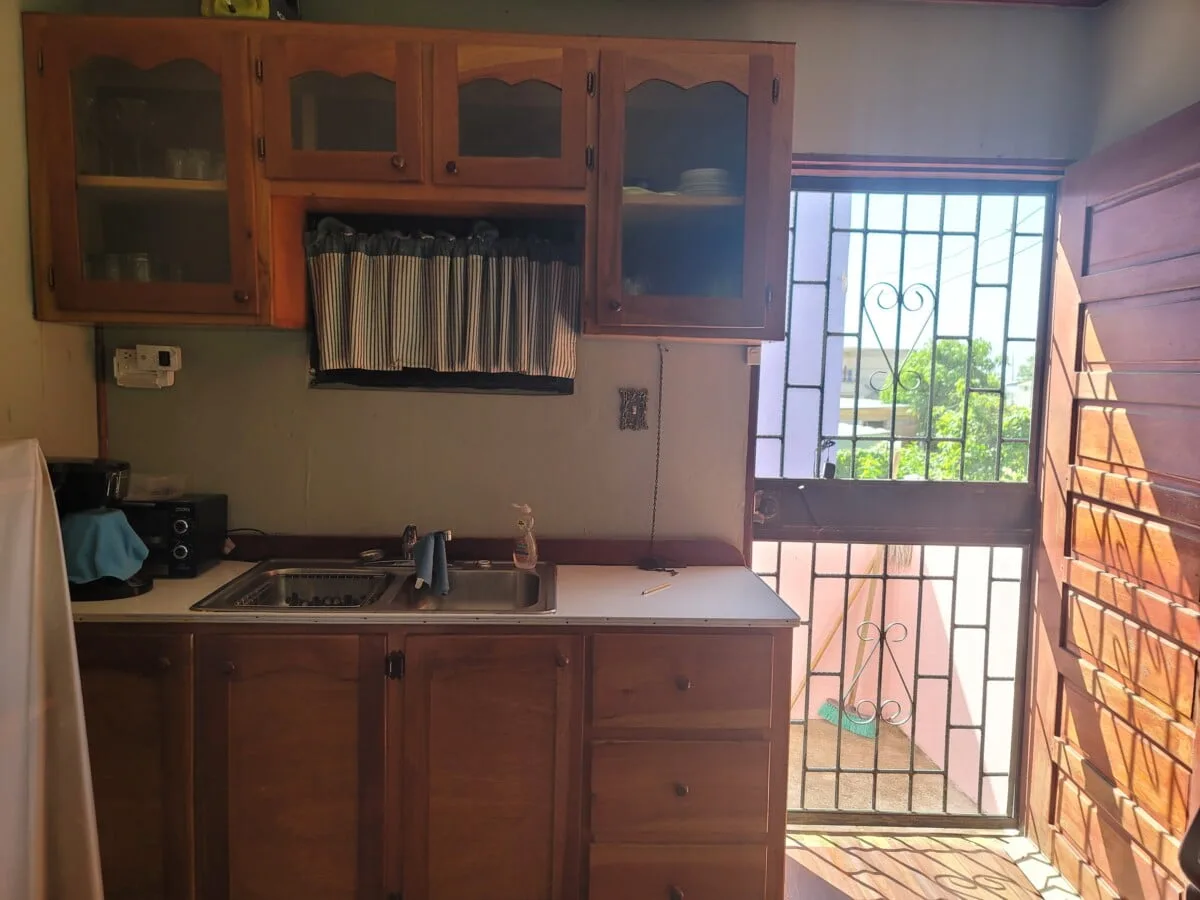 20231209_103909 FOR SALE – 2 STOREY DWELLING ON MAHOGANY STREET, ST MARTINS DE PORRES, BELIZE CITY