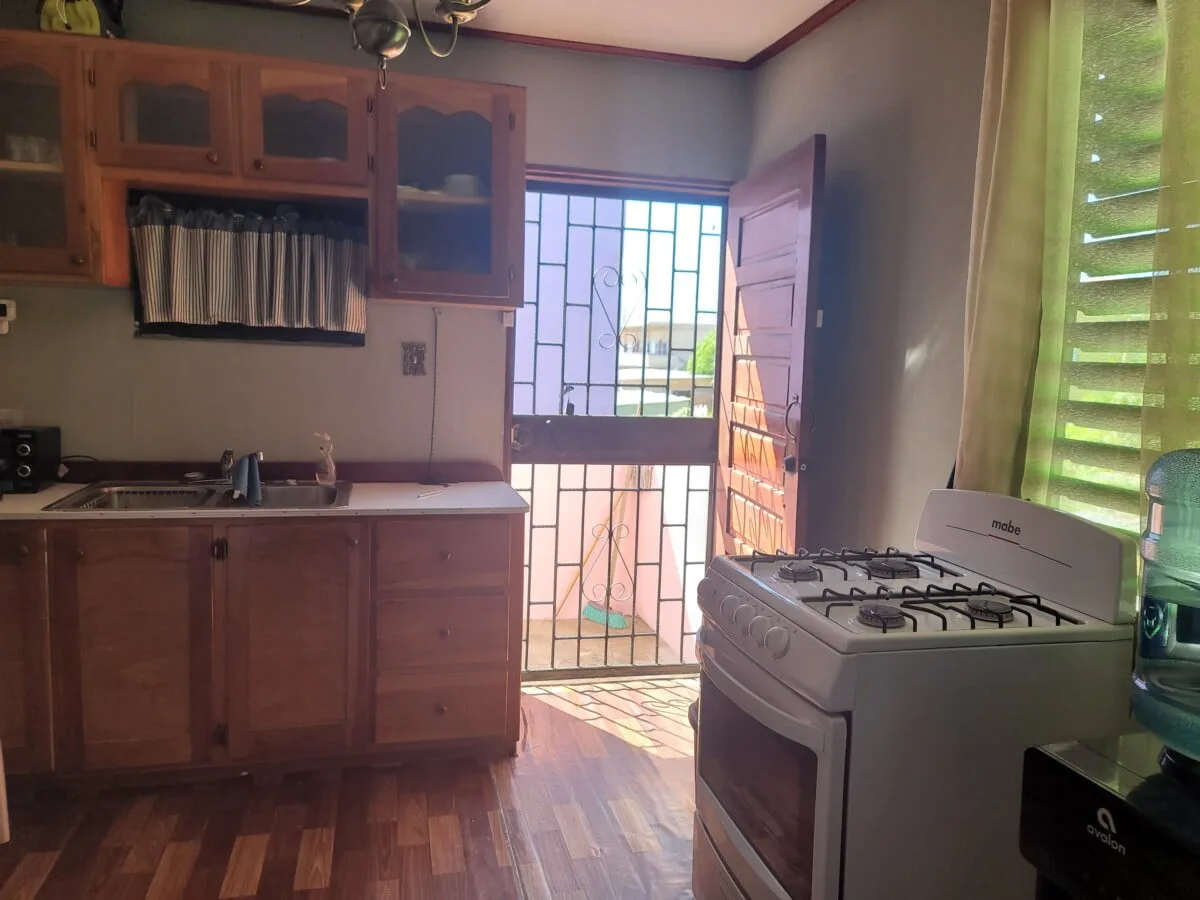 20231209_103916 FOR SALE – 2 STOREY DWELLING ON MAHOGANY STREET, ST MARTINS DE PORRES, BELIZE CITY