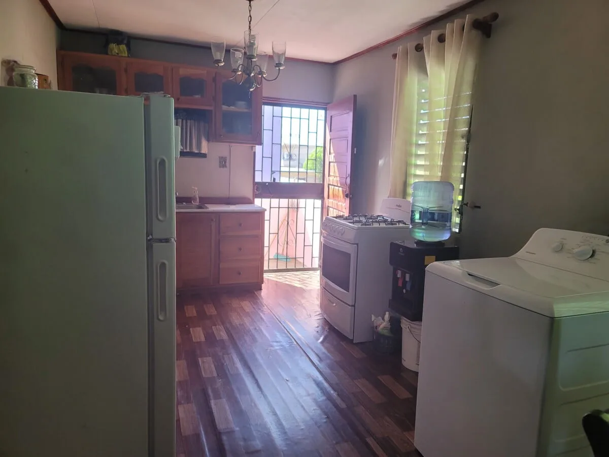 20231209_103926 FOR SALE – 2 STOREY DWELLING ON MAHOGANY STREET, ST MARTINS DE PORRES, BELIZE CITY