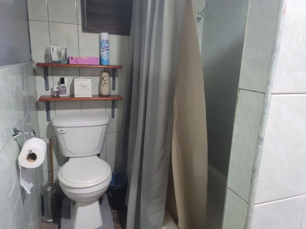20231209_104859 FOR SALE – 2 STOREY DWELLING ON MAHOGANY STREET, ST MARTINS DE PORRES, BELIZE CITY