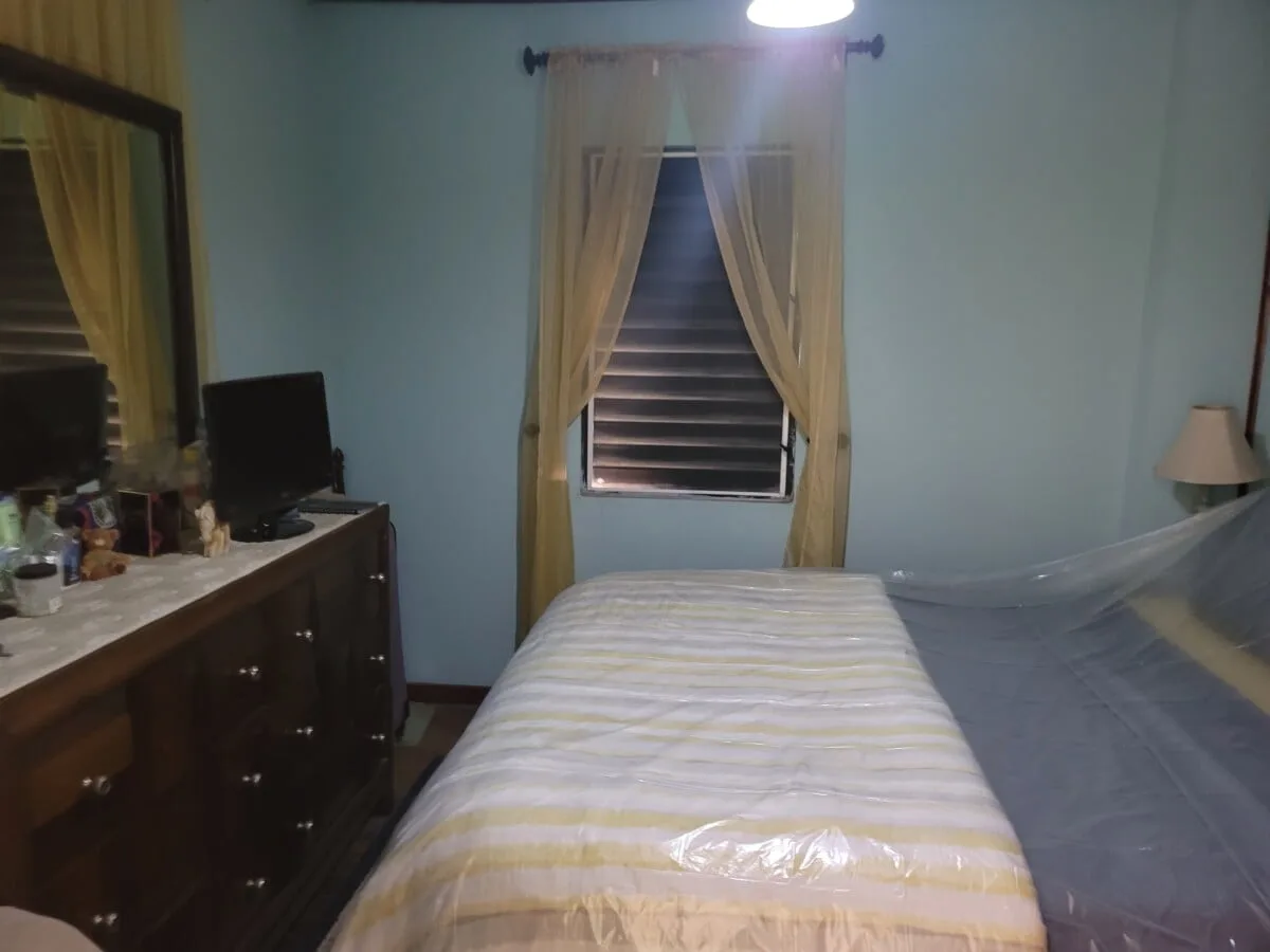 20231209_105002 FOR SALE – 2 STOREY DWELLING ON MAHOGANY STREET, ST MARTINS DE PORRES, BELIZE CITY