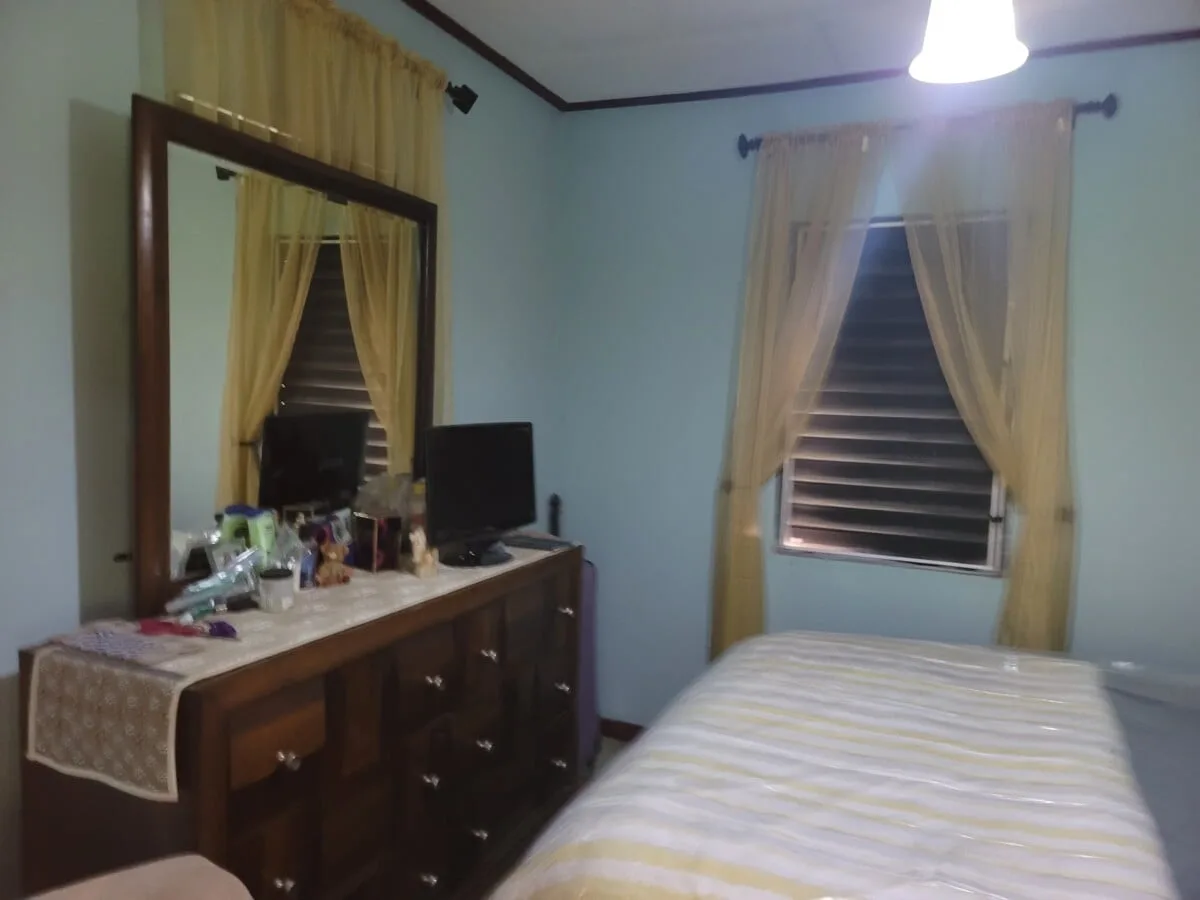 20231209_105005 FOR SALE – 2 STOREY DWELLING ON MAHOGANY STREET, ST MARTINS DE PORRES, BELIZE CITY