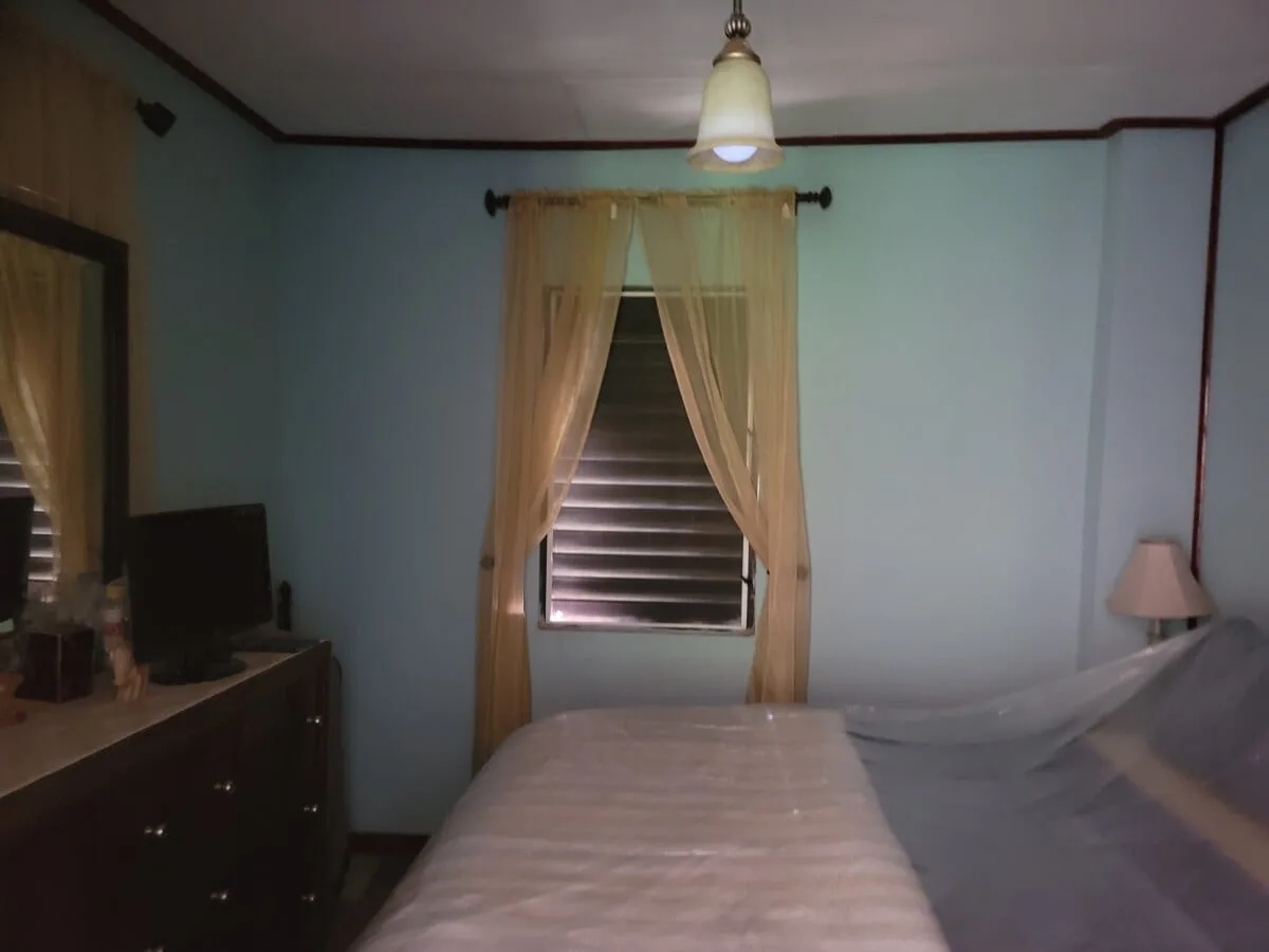 20231209_105020 FOR SALE – 2 STOREY DWELLING ON MAHOGANY STREET, ST MARTINS DE PORRES, BELIZE CITY
