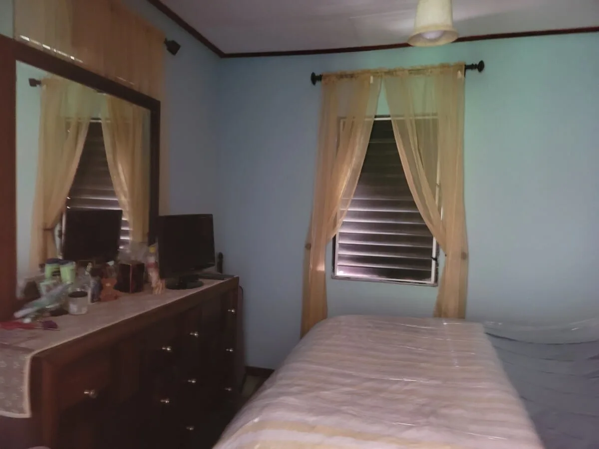 20231209_105024 FOR SALE – 2 STOREY DWELLING ON MAHOGANY STREET, ST MARTINS DE PORRES, BELIZE CITY