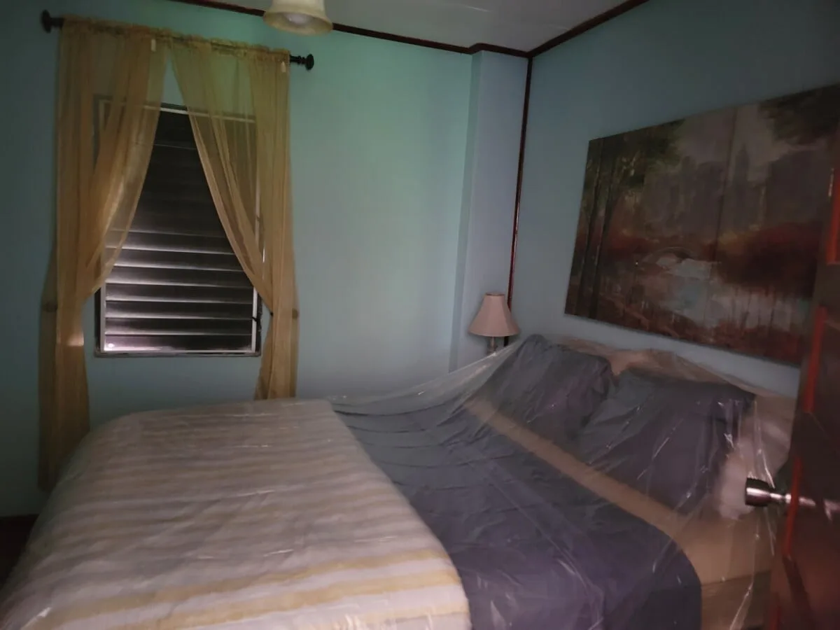 20231209_105028 FOR SALE – 2 STOREY DWELLING ON MAHOGANY STREET, ST MARTINS DE PORRES, BELIZE CITY